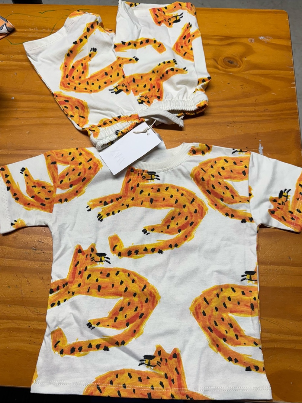 Zara White Tee with Orange Leopard Motif